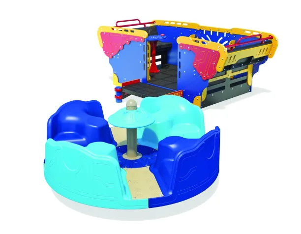 Accessible merry-go-round and boat-themed play structure on white background.
