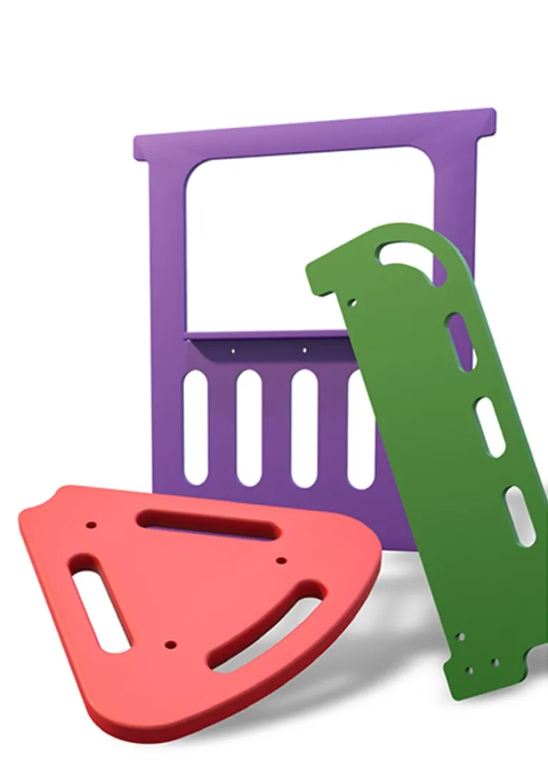Colorful playground panels including purple, red, and green shapes against a white background.
